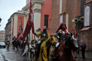armored horsemen in a cavalcade