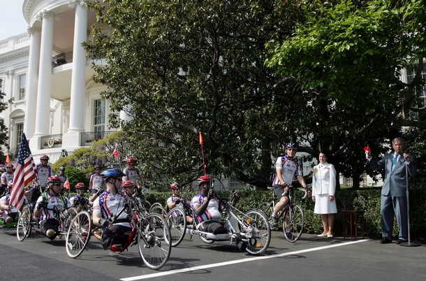 getty-afp-bush-blows-horn-soldier-ride.jpg