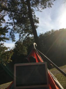 Lying in hammock