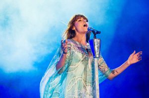 Florence Welch of Florence + the Machine mid song